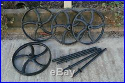 A Set Of 4 Black Cast Iron Wheels With Axles Hen House Wheels Shepherds Hut