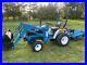 Ford_New_Holland_Compact_Tractor_With_Loader_And_Topper_Hydrostatic_01_xc