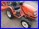 Kubota_4WD_compact_tractor_with_tiller_rotavator_01_zcld