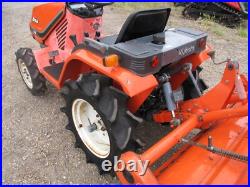 Kubota 4WD compact tractor with tiller rotavator