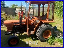 Kubota compact tractor and topper