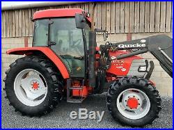 Mccormick cx 105 xtrashift tractor with quickie loader